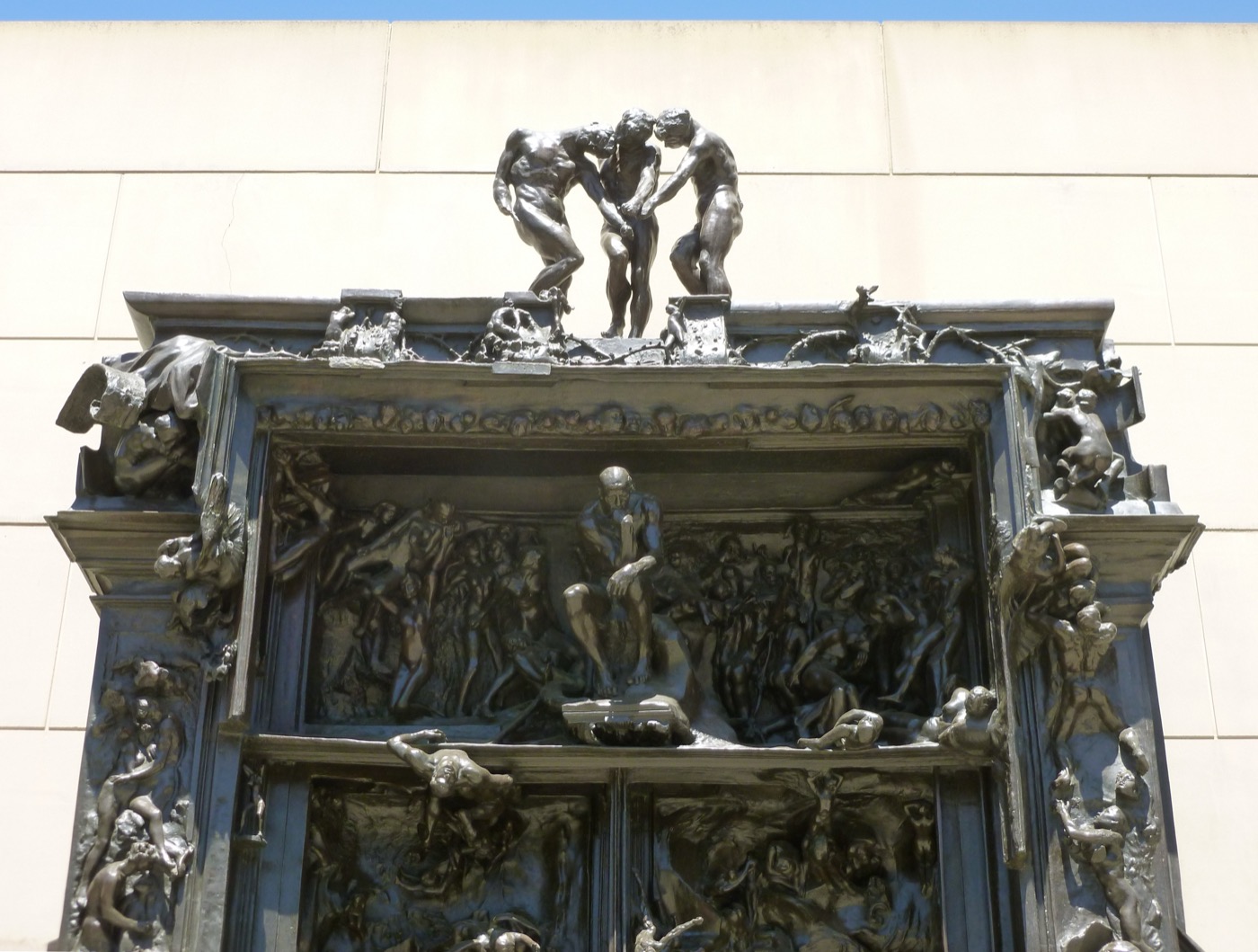Detail: The Three Shades and The Thinker on the lintel